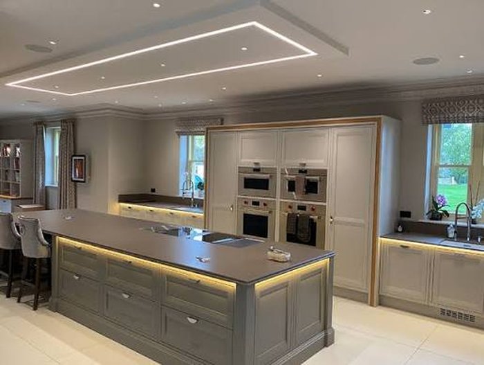 Recessed ceiling and under-cabinet lighting fitted in a kitchen